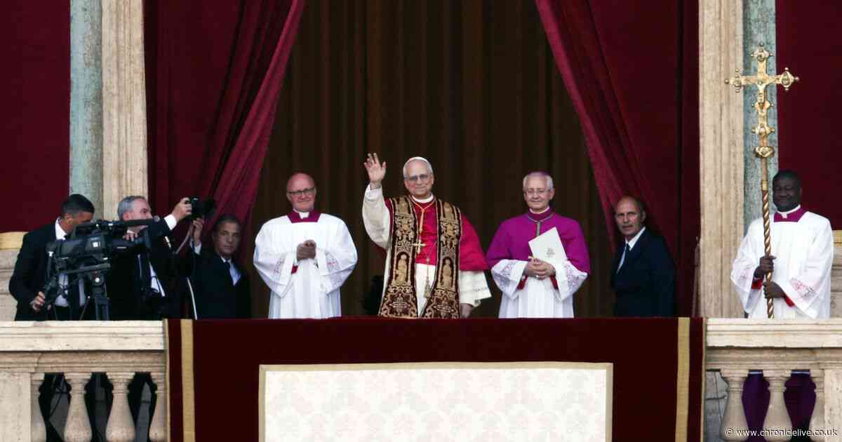 US President Donald Trump reacts as first American Pope in history Robert Prevost is elected