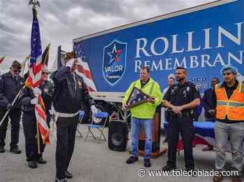 Veterans exchange flag during cross-country remembrance relay