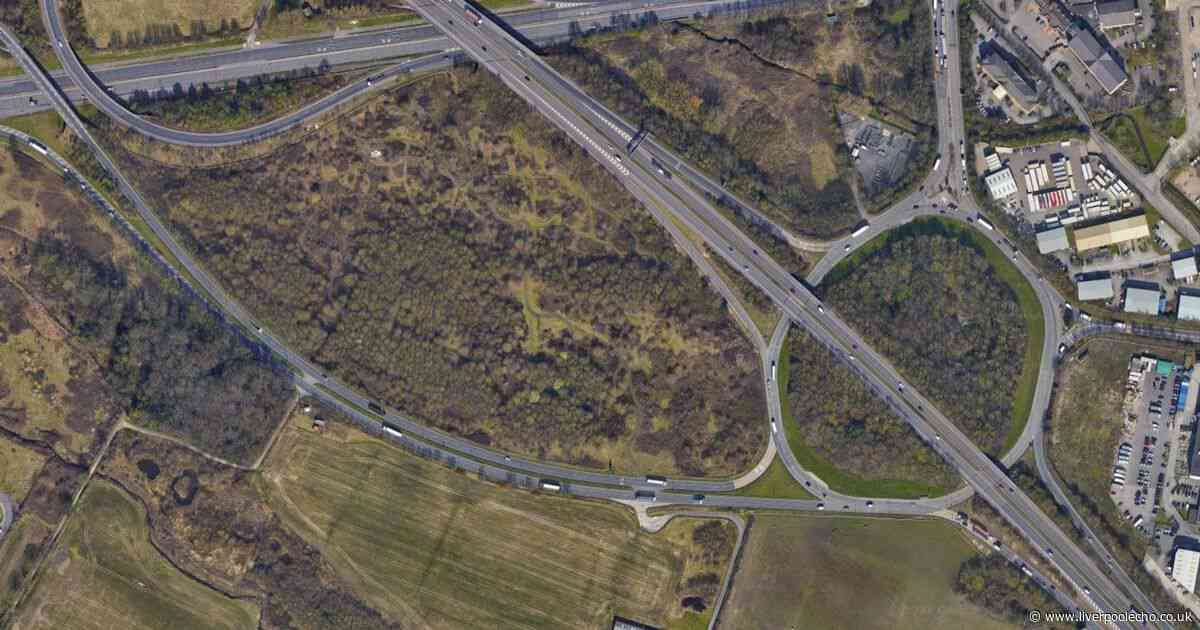 M57 blocked as lorry overturns after oil spill