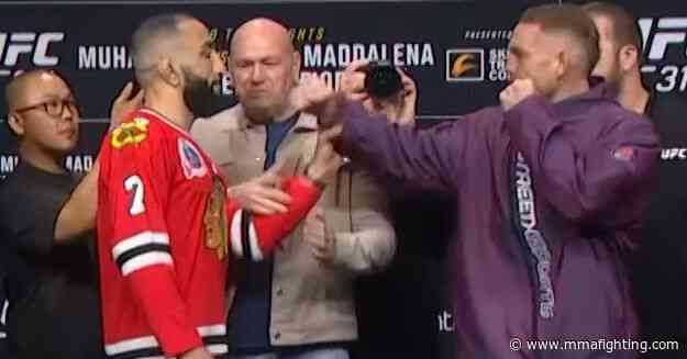 Watch Belal Muhammad swat Jack Della Maddalena’s arm away at UFC 315 press conference faceoff