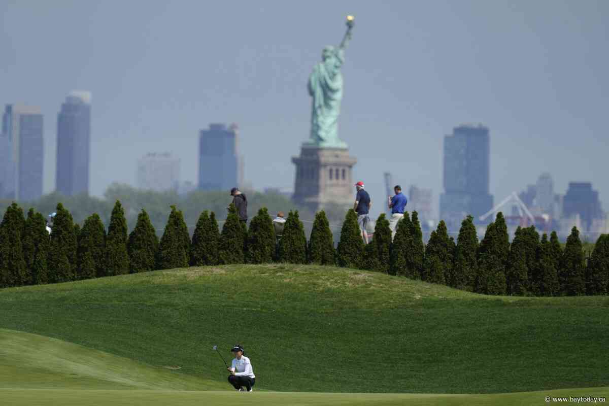 Jeeno Thitikul happy to see putts go in and lead at Liberty National with a 64