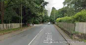 Two charged after burglary at Wirral house