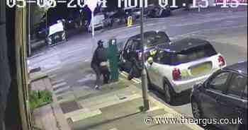 Shocking video shows woman being snatched from street and forced into stolen car
