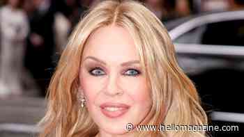 Kylie Minogue is ageless as she poses up a storm in waist-cinching jeans
