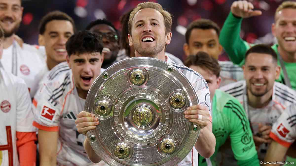Harry Kane lifts a trophy! England captain FINALLY gets his hands on first silverware of his career with Bayern Munich after Bundesliga glory