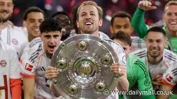 Harry Kane lifts a trophy! England captain FINALLY gets his hands on first silverware of his career with Bayern Munich after Bundesliga glory