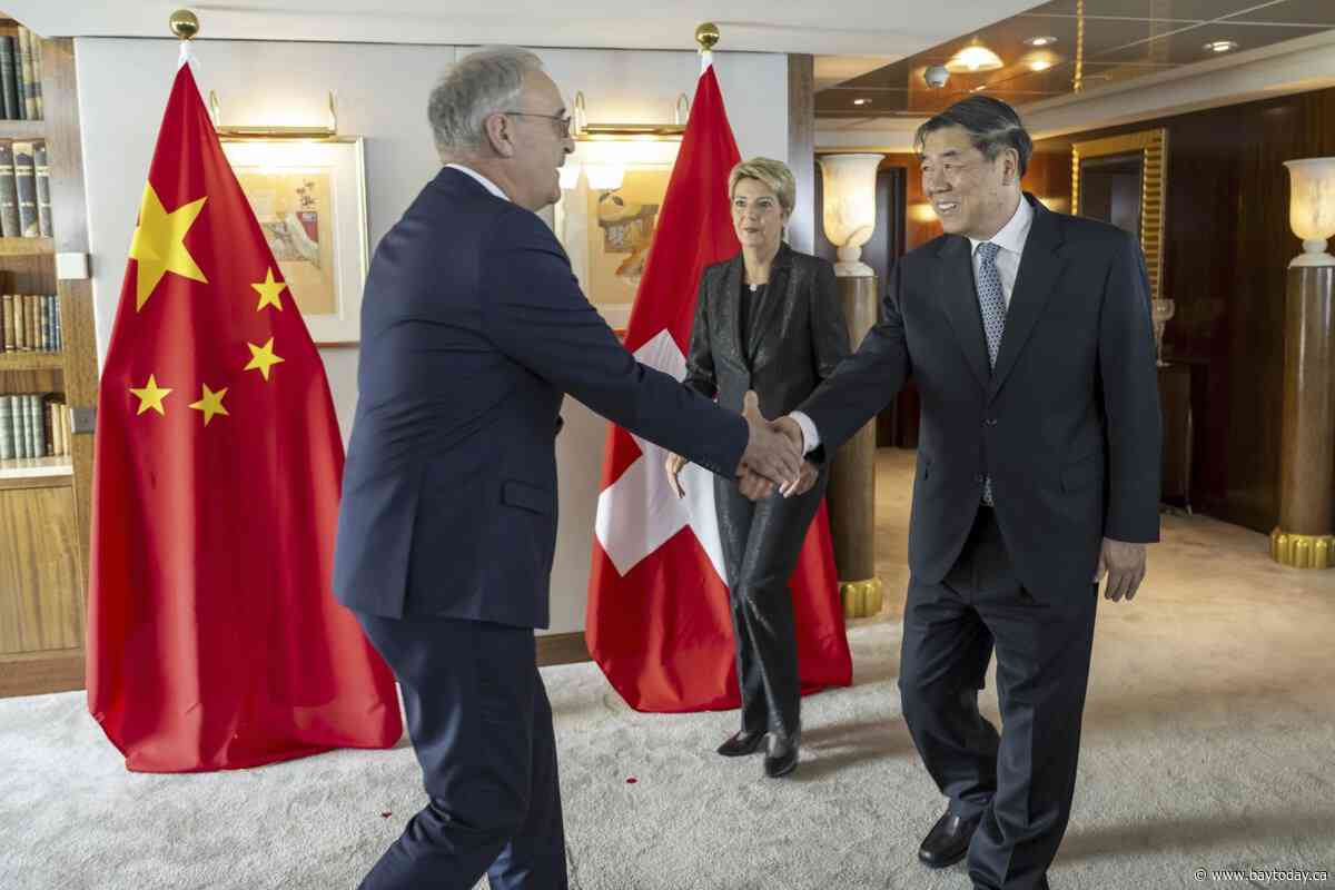 US-China tariff talks to continue Sunday, an official tells The Associated Press