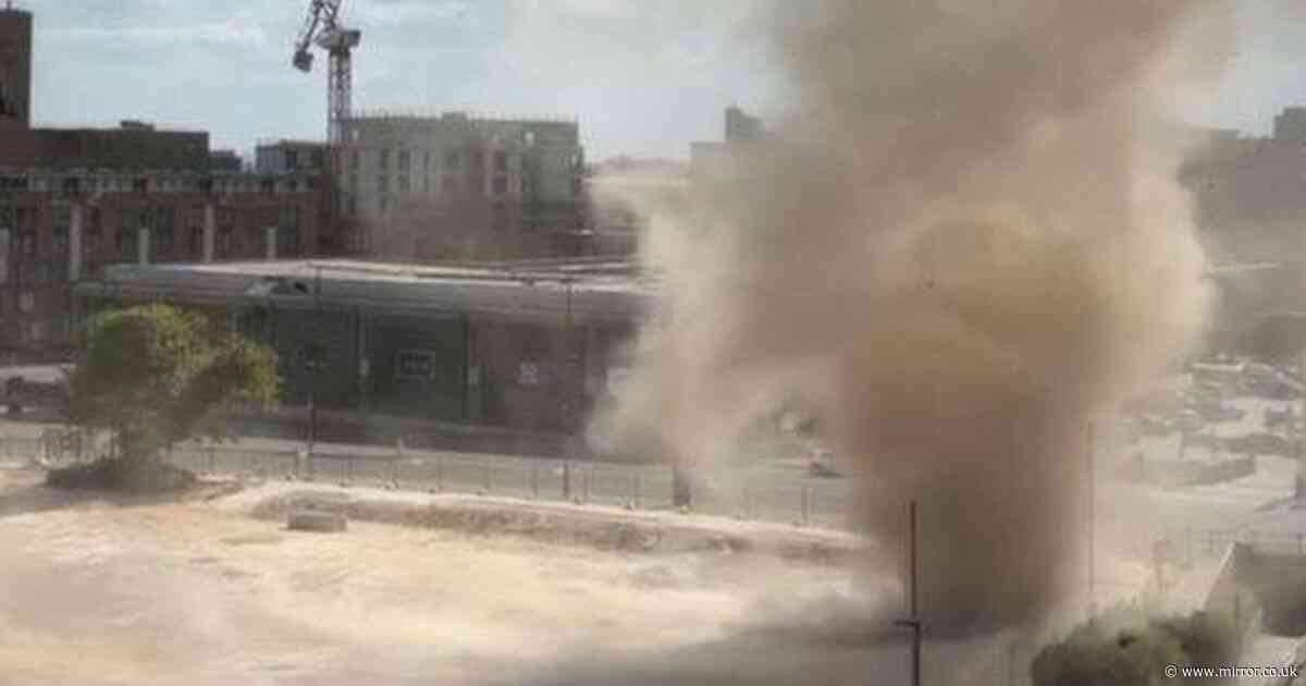 Tornado fears as 30m-high 'dust devil' tears through major UK city centre