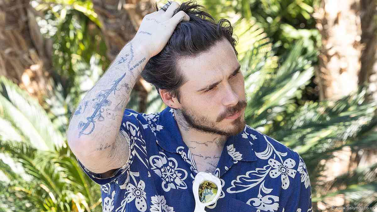 Revealed: Brooklyn Beckham's shocking reaction when David rang him - and how it drove his father to take desperate measures out of fear for his son, insiders tell KATIE HIND