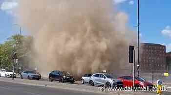 Petrifying moment 'dust devil' tornado tears through UK city leaving stunned Brits in its wake