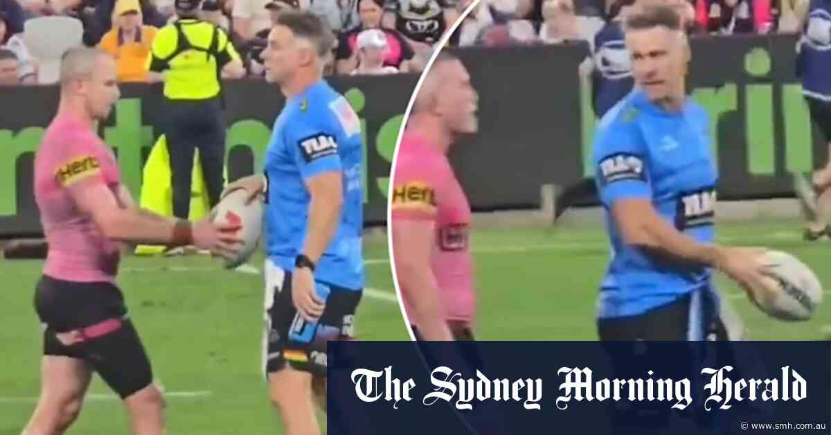 Panthers trainer sprays water on ball