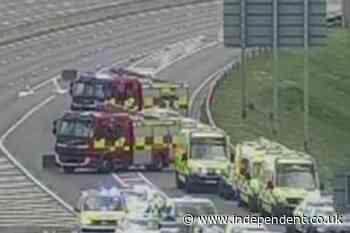 Child killed after minibus flips over on M4 in Berkshire