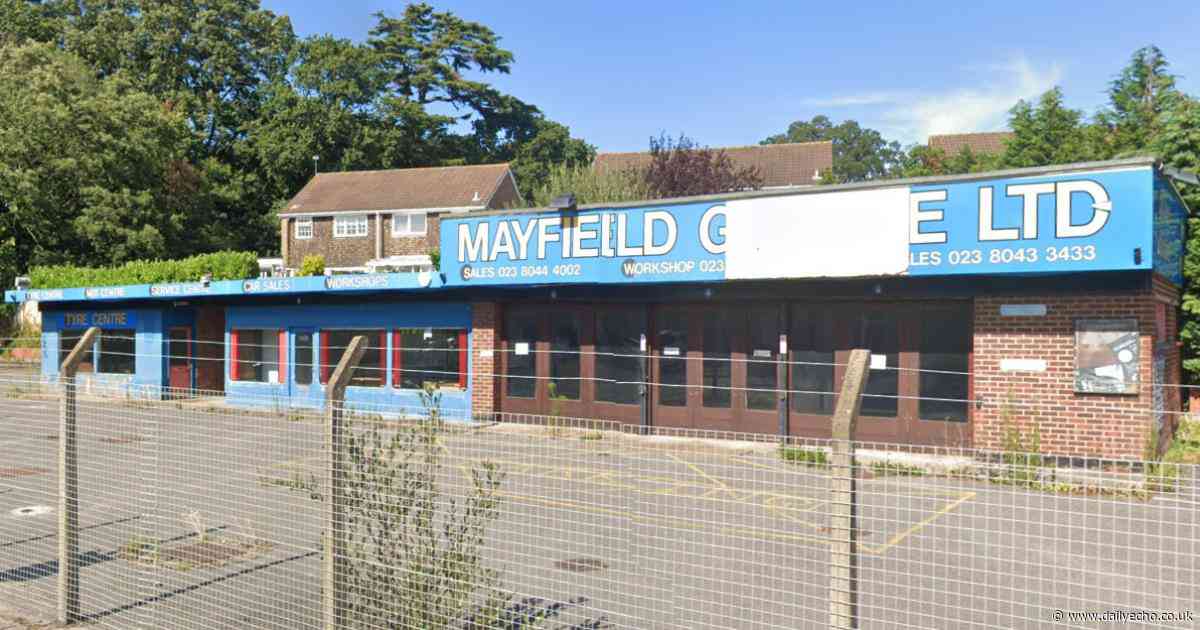 Progress in controversial scheme to build eight homes on car dealership site