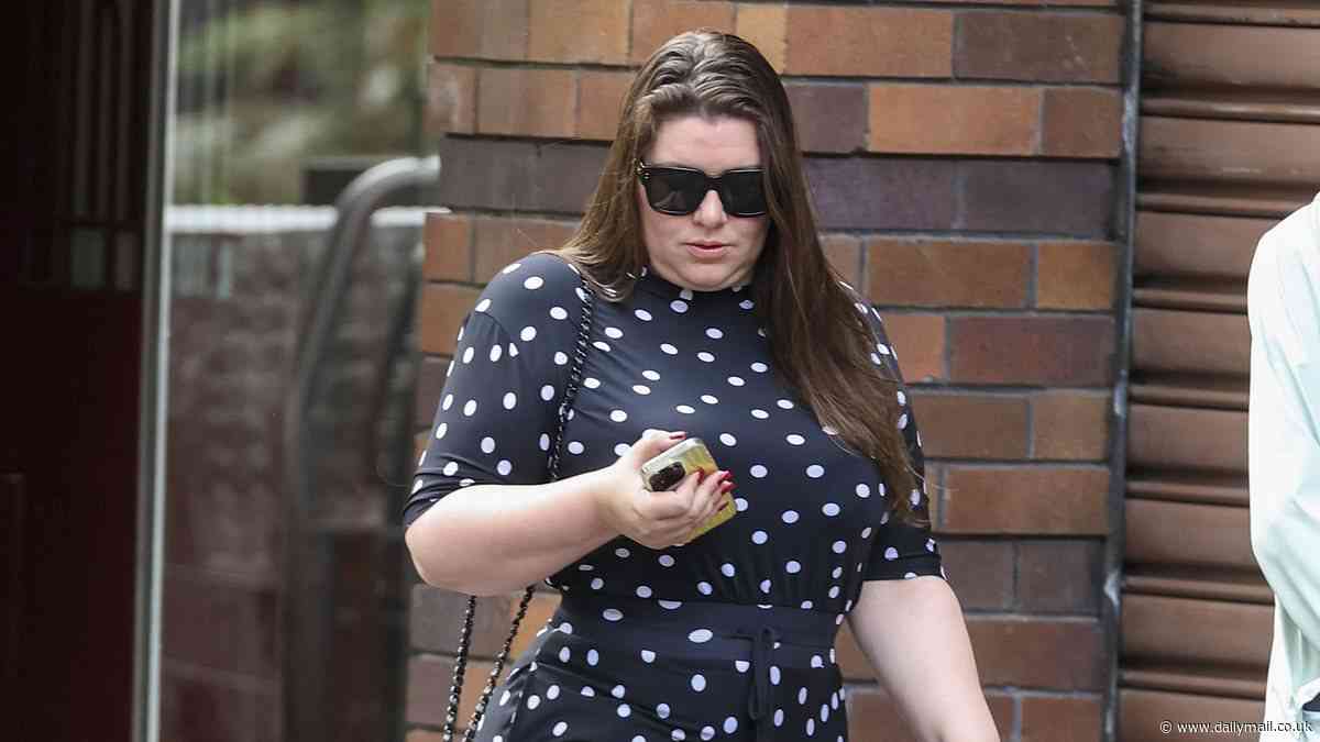 Spot on! Billionaire heiress Francesca Packer makes a fashion statement in an eye-catching black and white polka dot jumpsuit paired with Valentino heels and a Chanel tweed handbag