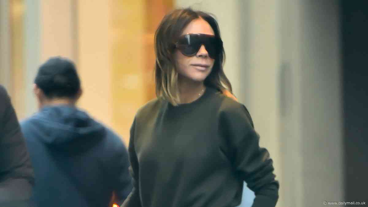 'Heartbroken' Victoria Beckham ditches her usual glamour for a tracksuit and trainers as she steps out in New York with David amid family rift with Brooklyn and his wife Nicola
