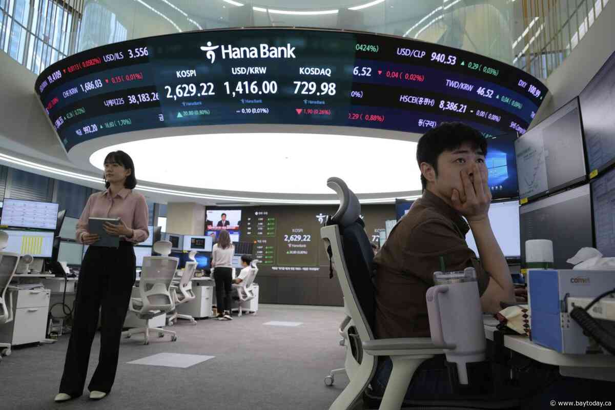 Asian shares mostly gain amid cautious relief over U.S.-China agreement