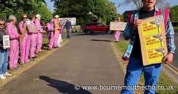 Protesters gather outside Hamworthy Club against incinerator