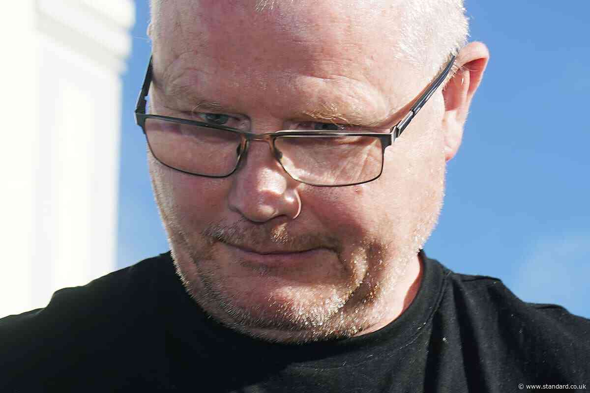 Murder accused cut dressing gown belt so he could hold dead wife, court hears