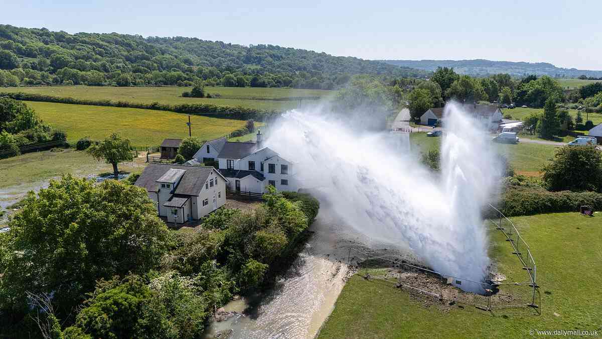 Burst pipe sends send thousands of gallons of water towering 100ft into the air amid dire drought warnings