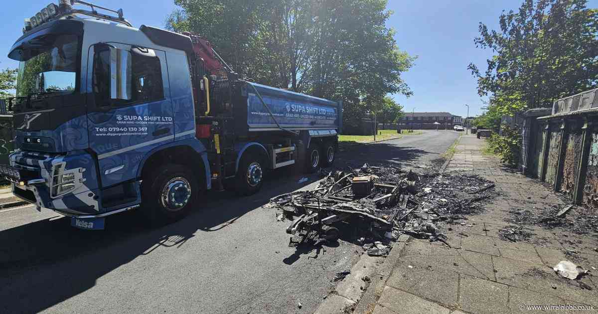 Burnt-out caravan ‘filled with rubbish’ damages road in Birkenhead