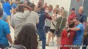 School choir performance EXPLODES into violent brawl between parents in dramatic video