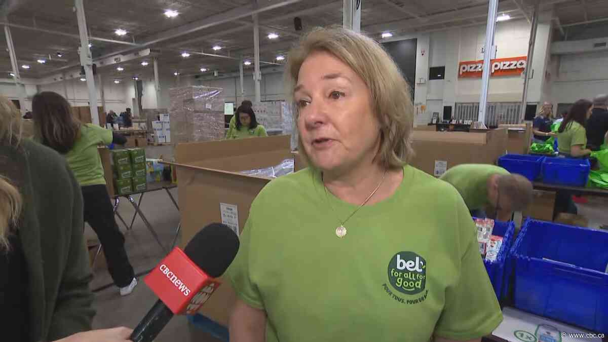 Toronto volunteers pack thousands of meal kits for kids this summer