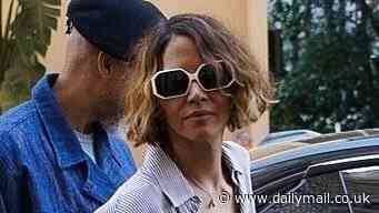 Halle Berry cuts a stylish figure in an oversized shirt and £30k Birkin bag as during Cannes Film Festival