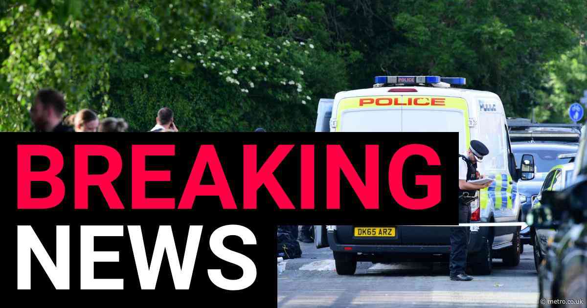 Man shot by armed police after double stabbing in Huyton