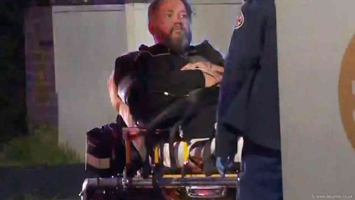 Armed attacker on the run in Sydney after two men were brutally stabbed in early-morning  assault