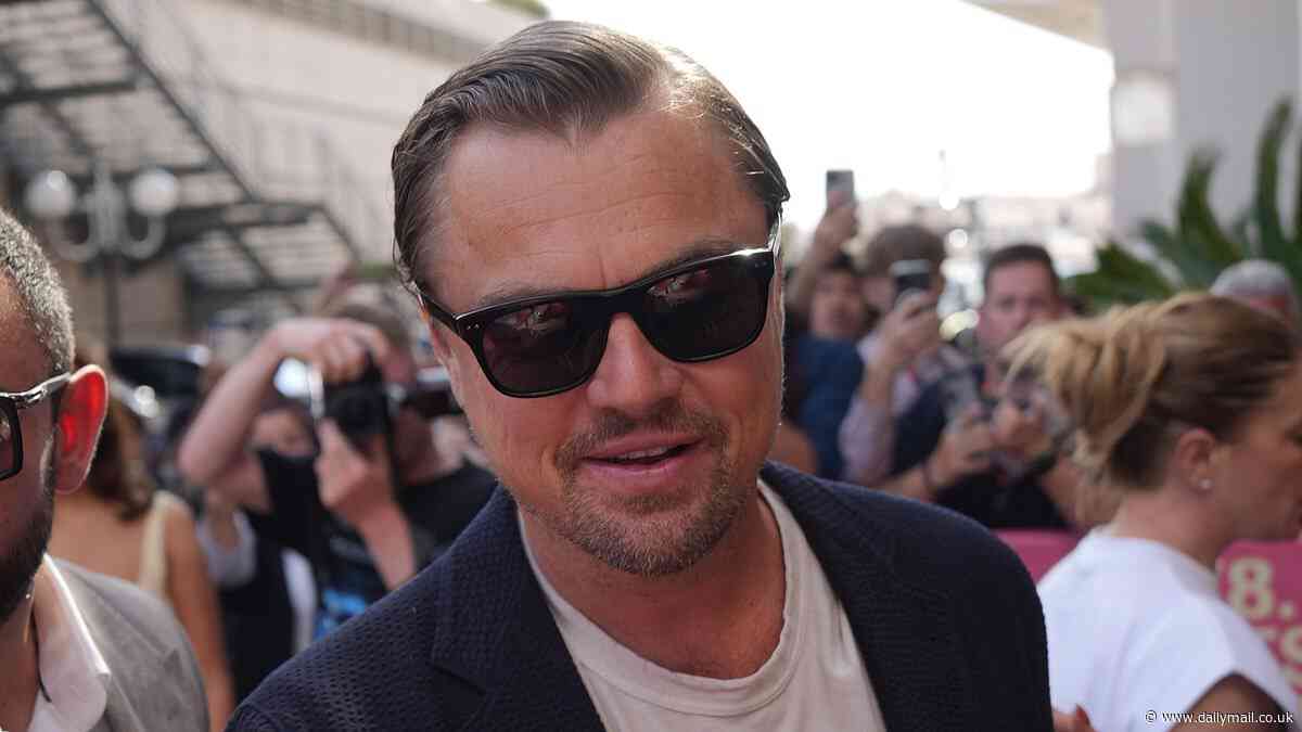 Leonardo DiCaprio, 50, cuts a dapper figure as he attends day two of Cannes Film Festival with glamorous girlfriend Vittoria Ceretti, 26