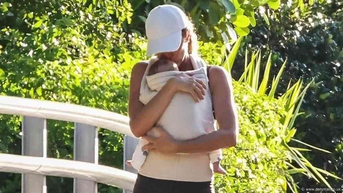 Gisele Bundchen showers baby boy with kisses on rare outing with her boyfriend Joaquim Valente