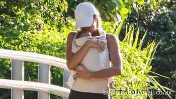 Gisele Bundchen showers baby boy with kisses on rare outing with her boyfriend Joaquim Valente