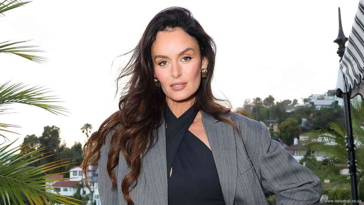 Nicole Trunfio shows off her long legs as she goes pantless at Anine Bing's 2025 summer collection launch in Los Angeles