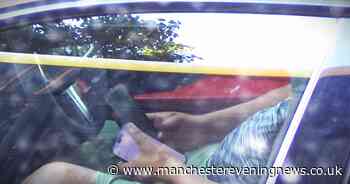 Driver caught with a phone in EACH HAND behind the wheel