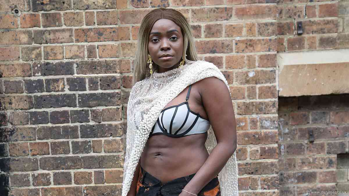 'Fake influencer' Suzan Mutesi arrives at Australian Fashion Week wearing just a bra as a top - after causing chaos last year by rocking up in a towel