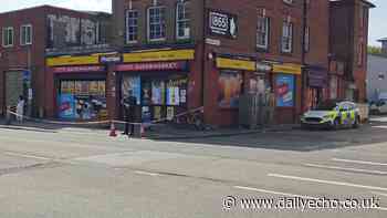 Convenience store cordoned off by police - live updates