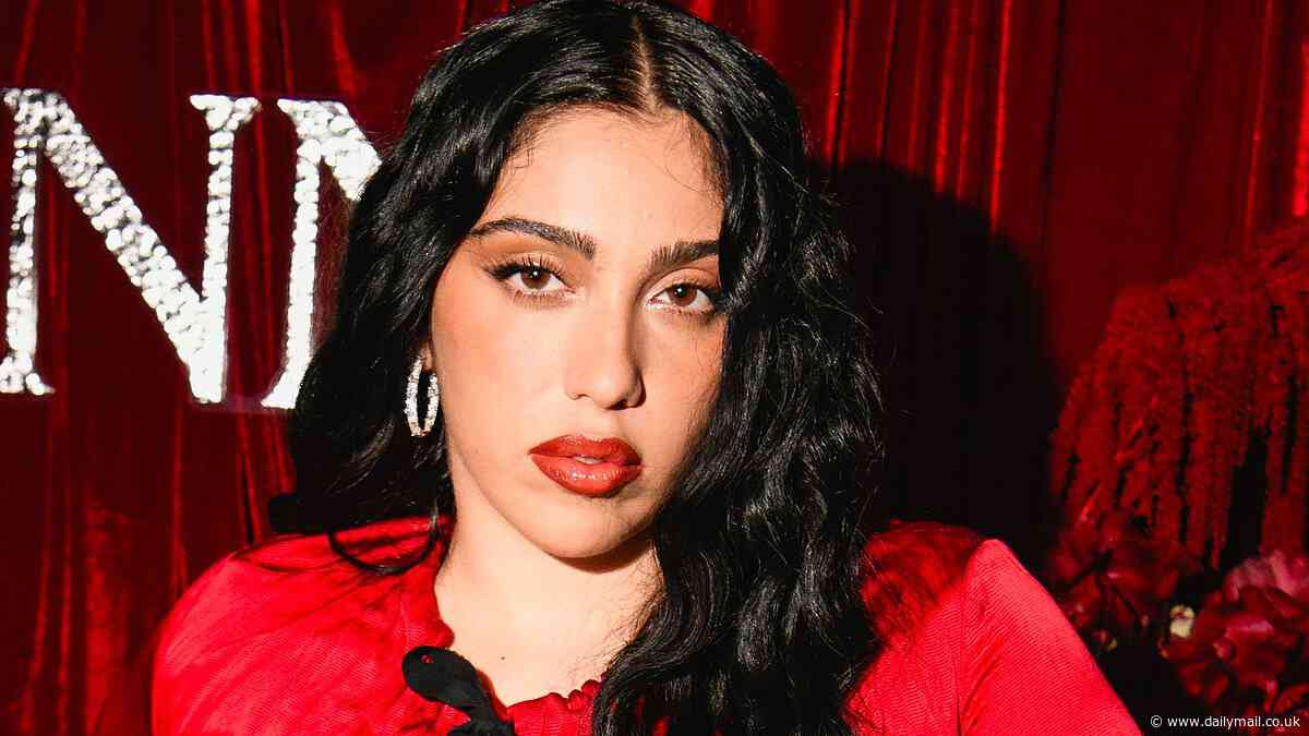 Madonna's daughter Lourdes Leon shows off her amazing figure in a red bralette as she joins lingerie-flashing Julia Fox at for racy performance at The Box in New York