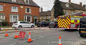 Road taped off by fire service as shop evacuated
