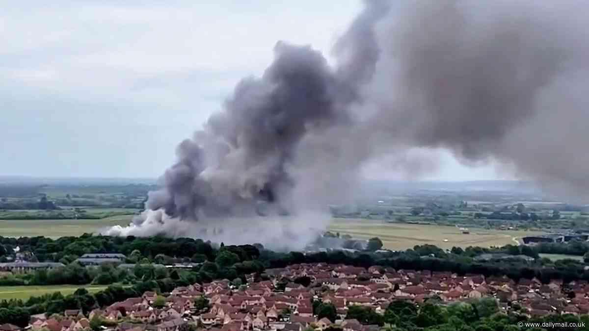 Bicester fire: Multiple explosions heard as blaze rips through former RAF base - with smoke seen for miles