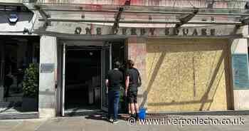 Masked bikers seen fleeing after city centre offices smashed up and covered in red paint