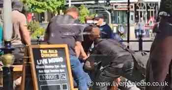 Video shows moment police detain 'the wrong guy' outside pub