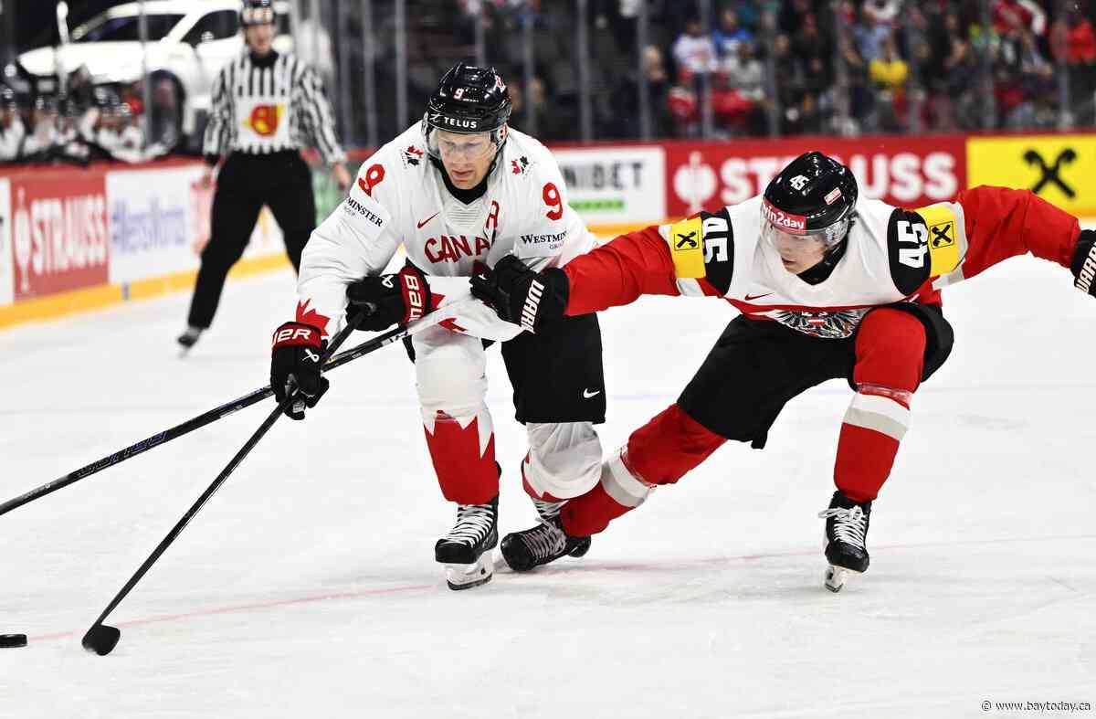 MacKinnon has two goals, assist as Canada beats Austria 5-1 at hockey worlds
