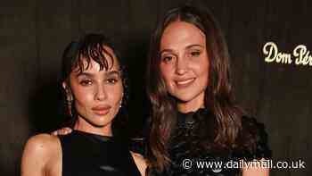 Alicia Vikander puts on a leggy display in a black disc-embellished mini dress as she joins glamorous Zoë Kravitz at star-studded Moët Hennessy party in London