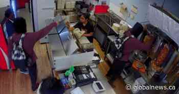 WATCH: Robber uses machete to terrify donair shop staff before shaving himself some meat
