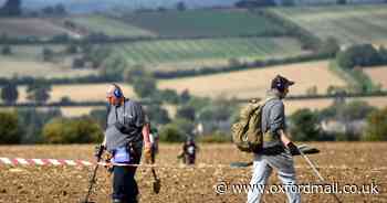 Metal detectorist finds hoard of historic coins in field