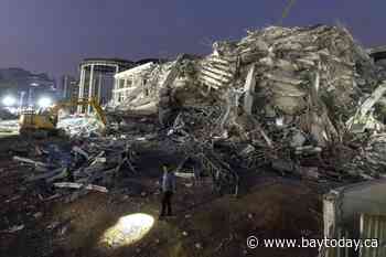 Thai construction magnate surrenders on felony negligence charges over building collapse in quake