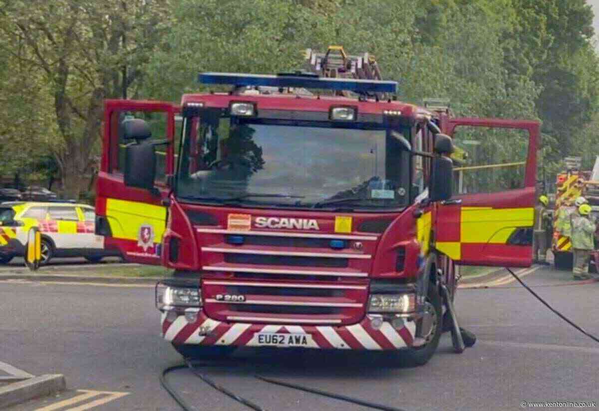 Firefighters battle garages and van blaze