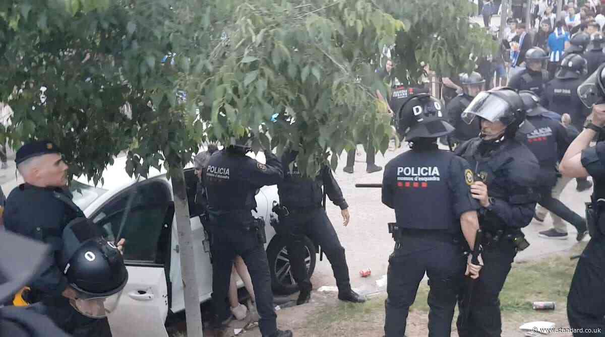 Shocking moment car ploughs into fans before Barcelona's title-winning match against city rivals Espanyol