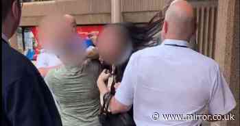 Woman ragged by her hair as brawl erupts outside court with blows traded