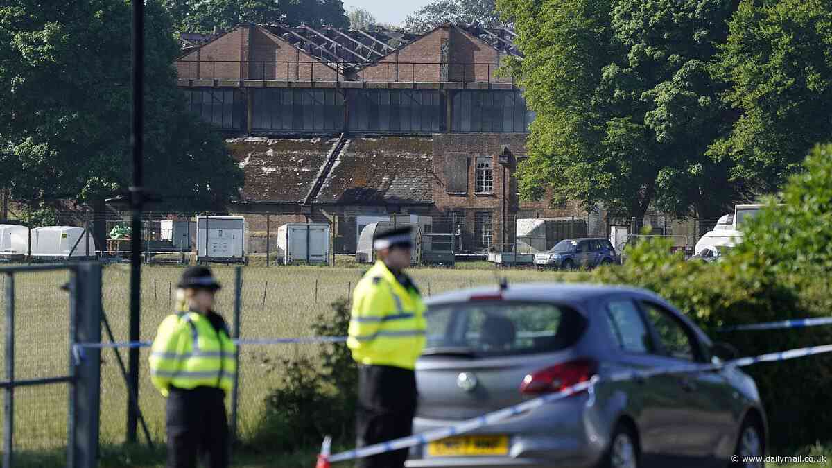 Three dead in Bicester fire: Two firefighters and one member of the public killed after multiple explosions heard as blaze rips through former RAF base